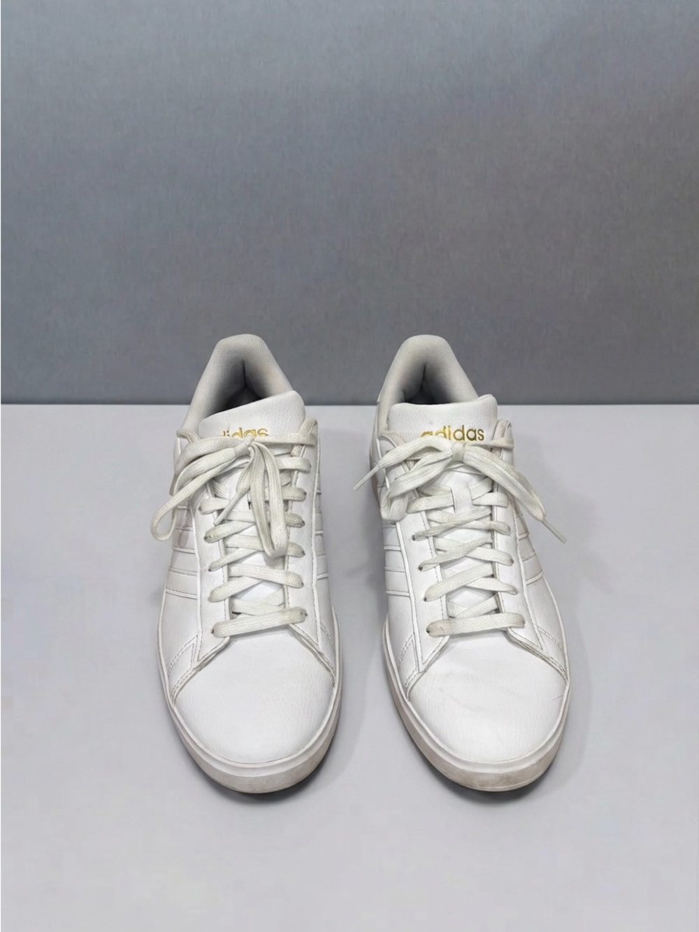 adidas White Leather Low-Top Sneakers with Gold Logo